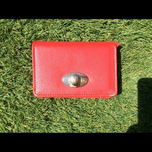 Red coin wallet with flower pattern pouches inside